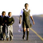 Children run to school in Kwa-Zulu Natal, South Africa